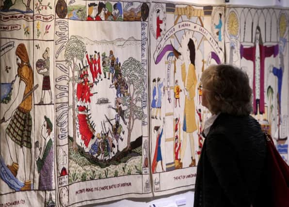 FILE PICTURE - The Great Tapestry of Scotland, measuring 143 meters which shows important moments in Scottish history from pre-history to modern times at the Scottish Parliament. See Centre Press story CPTAPESTRY; Fears have been raised that the mystery theft of a stitched panel depicting the suspected resting place of the HOLY GRAIL will never be solved. Police are still hunting a thief who nicked a stitched panel from the Great Tapestry of Scotland depicting the iconic Rosslyn Chapel in June. It is one of 160 individual panels which make up the artwork, stitched together by more than 1,000 volunteers from across country.