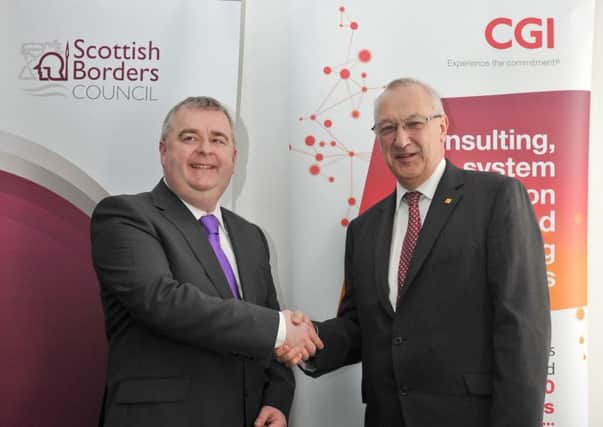 Council leader David Parker and CGI's UK president Tim Gregory secure the deal.