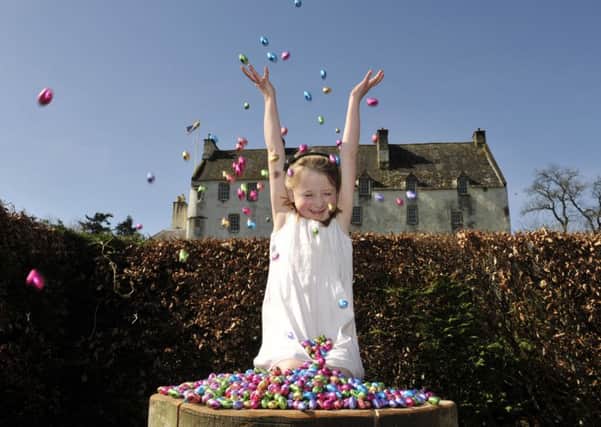 Six year old Millie Macdonald inside the maze at Traquair House, Traquair. An Easter Eggstravaganza is planned for Easter Sunday with an egg search in the maze at Traquair House.