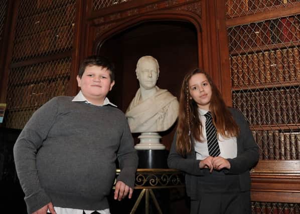 Aiden McMullen and Aimee Blair acted as tour guides for the rest of their class as Burgh Primary pupils visit Abbotsford House (pictured with the Walter Scott bust in the library)

Burgh Primary School P5/6 classes using the education centre at Abbotsford House.