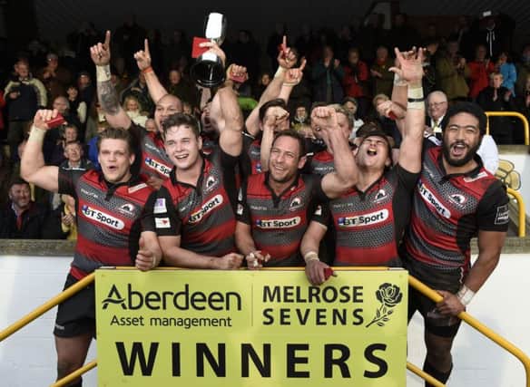 Edinburgh celebrate with the trophy after winning the final of the Melrose Seven, at the Greenyards. Picture Ian Rutherford