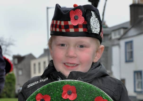 Five year old  Leyton Blake from Chirnside Nursery as wreath bearer at Stranraer War Memorial at the Sunset Act of Remembrance on April 1.