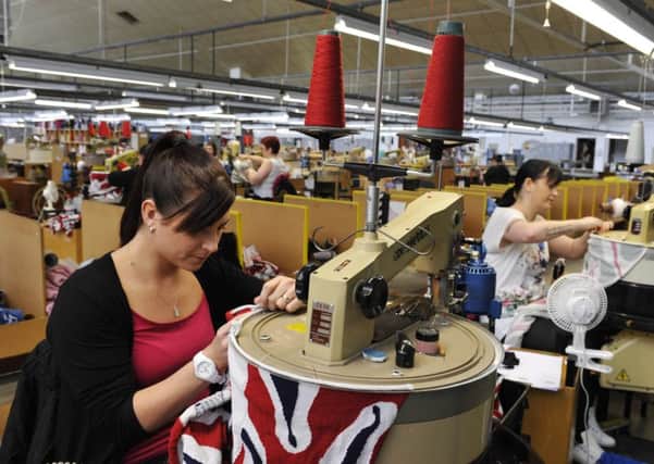 Barrie Knitwear's pre-tax profits fell from nearly Â£1.8 million to Â£1.2 million due to rising costs trimmed margins.