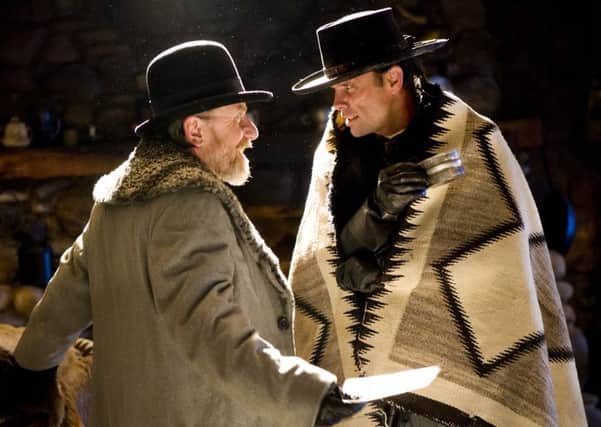 Undated Film Still Handout from THE HATEFUL EIGHT. Pictured: TIM ROTH and WALTON GOGGINS. See PA Feature FILM Reviews. Picture credit should read: PA Photo/The Weinstein Company. WARNING: This picture must only be used to accompany PA Feature FILM Reviews.
