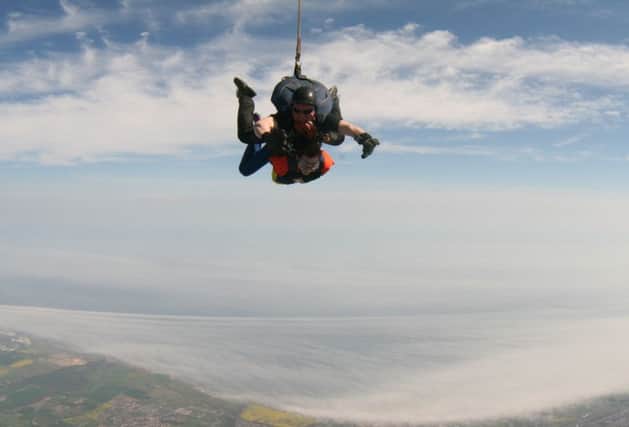 Samantha Moffat, of Hawick, bottom, doing a charity skydive in County Durham.