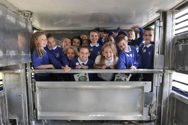 Pupils from Broomlands Primary and St Peters are shoved in a livestock lorry.