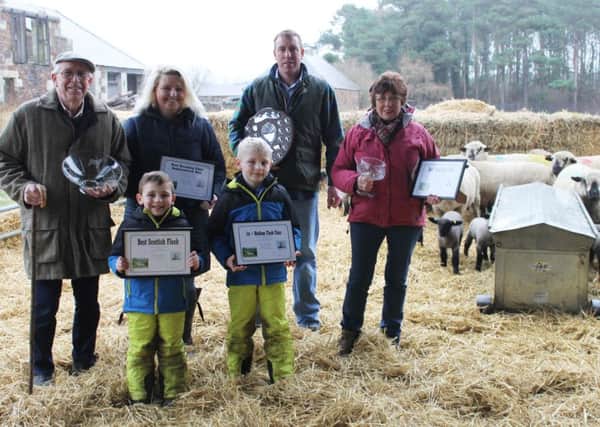 The Brand family with some of the Eastfortune flock; from left  Richard, Jane, Grant and Janey with four year old Robert and Ritchie, six years.
