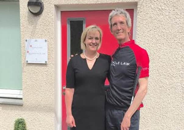 SBSR Peebles firm Cycle Law Scotland is sponsoring the Scotland leg of Ken Reid's (here with CLS' Brenda Mitchell) 750-mile tandem journey