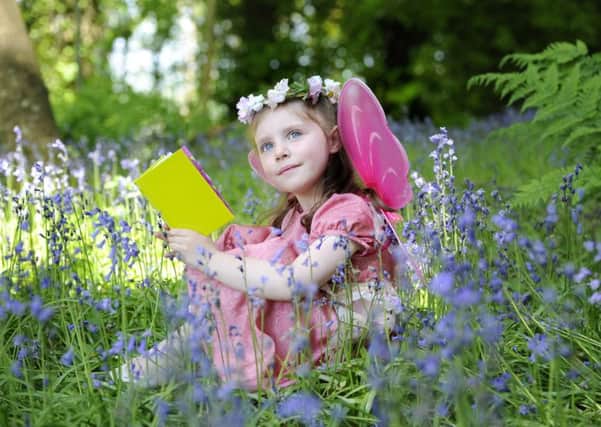Four-year-old Eilidh Steel launches the first ever Andrew Lang's Fairy Tale Festival in the gardens of The Haining, Selkirk. 
Photo by Colin Hattersley.
