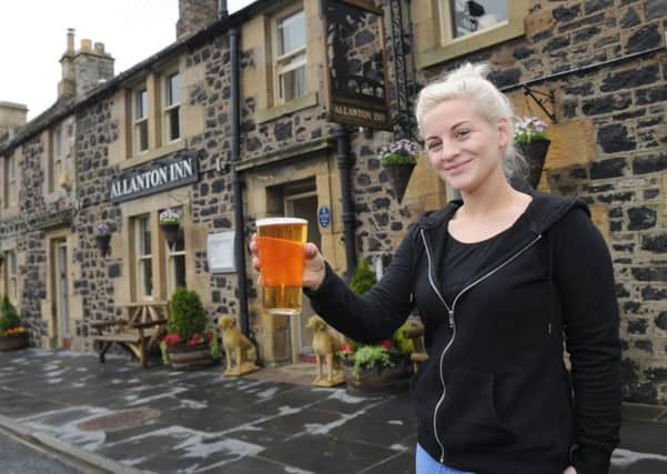Barmaid Katie Purves at the Allanton Inn getting set for their forthcoming beer festival