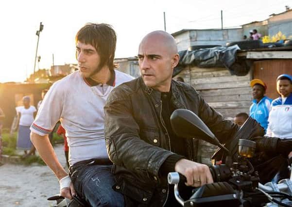 Mark Strong and Sacha Baron Cohen in Columbia Pictures' THE BROTHERS GRIMSBY.