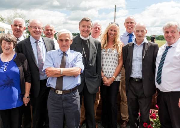 Family members of the boys who died, along with the two survivors from the tragedy and others who were involved, along with Reverend Alan Cartwright, who took the service.