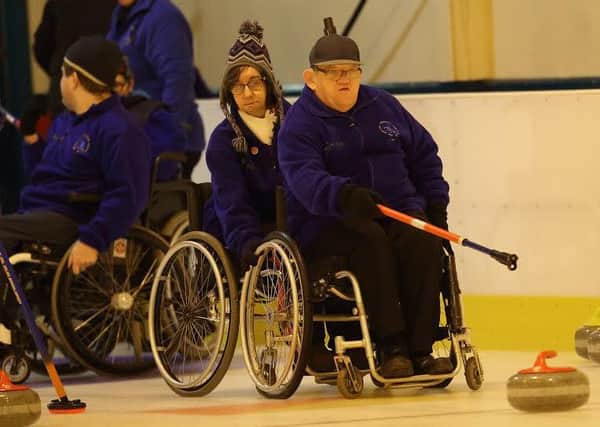 SBSR Borders Wheelchair Curlers Donald Metcalf and Sandra Dixon in action.