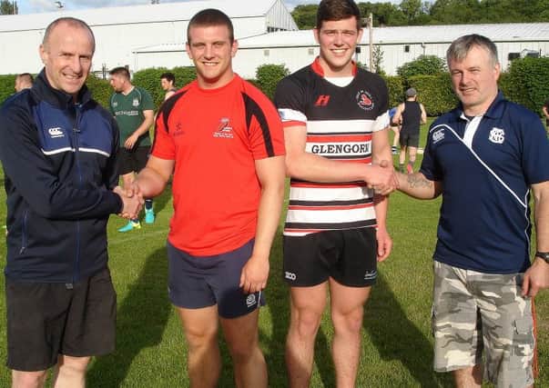 Connor McAulay (second left) and Ciaran Whyte (second right) with Selkirk first XV coaches Michael Jaffray (left) and Fraser Jack.