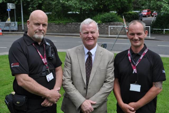 Hawick and Hermitage councillor David Paterson, Scottish Borders Council's environmental services executive member, meets new dog fouling and littering enforcement officers Tony Garrick, left, and Paul Marenghi.