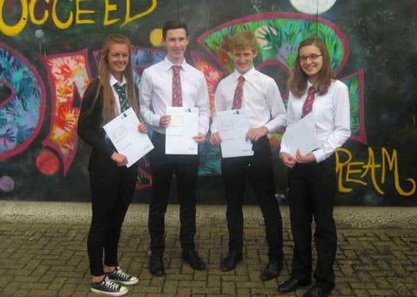 Hawick High - Emma Grieve, Euan Chelley, Murray Cockburn and Katie Campion 
Emma Grieve (new S5):  was really chuffed with my results, I was surprised as some were unexpected. It now means I can go on to study the five subjects I want at Higher in the coming year.
Murray Cockburn (new S6): "I am over the moon with my results, as I wasnt expecting to get the grades that I did. It now means that I can apply to study Civil Engineering at the university I want to. 
Ewan Chelley (new S6): I was really pleased with my results and achieving five Highers in S5. It keeps my options open as I am still deciding what I would like to study at university. I am now really looking forward to S6 and taking on the role of Head Boy at Hawick High School.
Katie Campion (new S6): I am so pleased with the grades I obtained. It is such a relief that this past year has been worth it. Thank you to all the staff who supported me and helped me succeed over the last year.