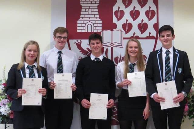 Earlston High pupils - Duncan Moore, Bethany Hamilton, Euan Clarke, Iona Clark, Robbie McLeish
 
Euan Clarke, receiving his S4 exam results, said: "I am absolutely over the moon with my results, so pleased that the hard work has actually paid off and it has been great to hear the good news of my pals as well."