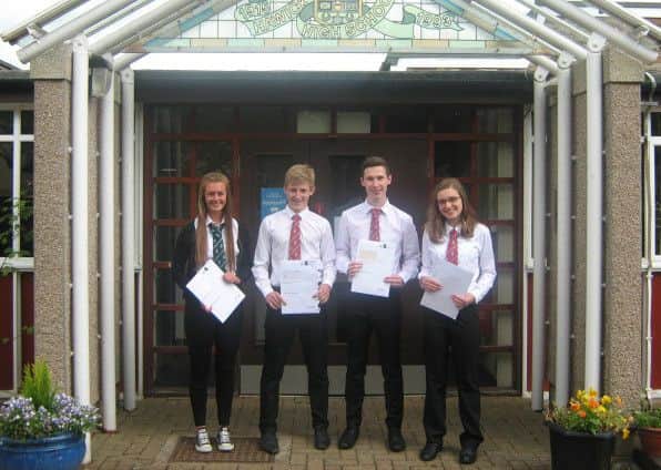 Hawick High - Emma Grieve, Euan Chelley, Murray Cockburn and Katie Campion 
Emma Grieve (new S5): I was really chuffed with my results, I was surprised as some were unexpected. It now means I can go on to study the five subjects I want at Higher in the coming year.
Murray Cockburn (new S6): "I am over the moon with my results, as I wasnt expecting to get the grades that I did. It now means that I can apply to study Civil Engineering at the university I want to.
Ewan Chelley (new S6): I was really pleased with my results and achieving five Highers in S5. It keeps my options open as I am still deciding what I would like to study at university. I am now really looking forward to S6 and taking on the role of Head Boy at Hawick High School. 
Katie Campion (new S6): I am so pleased with the grades I obtained. It is such a relief that this past year has been worth it. Thank you to all the staff who supported me and helped me succeed over the last year.