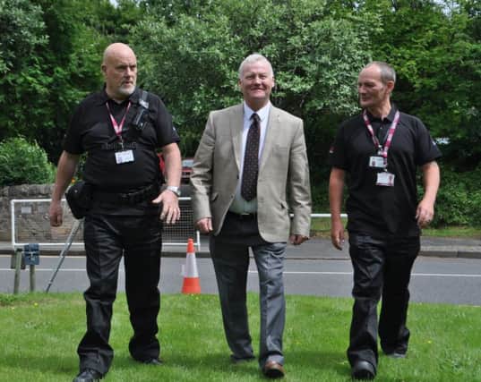 Hawick and Hermitage councillor David Paterson, Scottish Borders Council's environmental services executive member, meets new 3GS dog fouling and littering enforcement officers Tony Garrick, left, and Paul Marenghi.