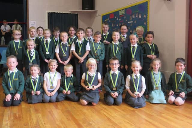 Drumlanrig St Cuthbert's Primary School pupils with their gold awards.