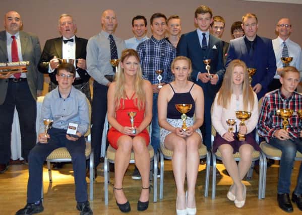 Jazmine Tomlinson and Brodie Cowan both of Jedburgh, seated third and fourth left, among the SHGA award winners 2016