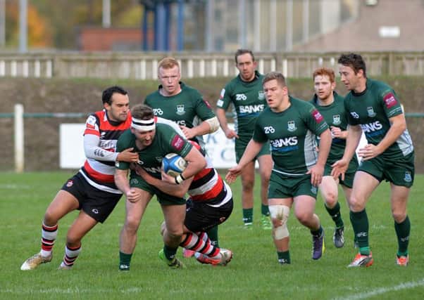 Hawick's Lee Armstrong gets some Stirling attention (picture by Alwyn Johnston)