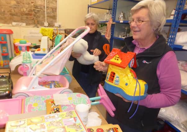 Volunteers working for Borders furniture reuse charity Home Basics sort out items at its Walkerburn depot for a Christmas toy sale. The event will be held at St Andrews Leckie Hall in Peebles on Saturday, November 26, running from 10am-3pm.