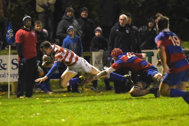 South full-back Lewis Young, of Jed-Forest, makes a dive for the line (picture by Stuart Cobley)