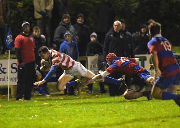 South full-back Lewis Young, of Jed-Forest, makes a dive for the line (picture by Stuart Cobley)