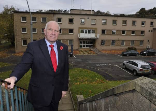 Councillor Watson McAteer outside Hawick police station.
