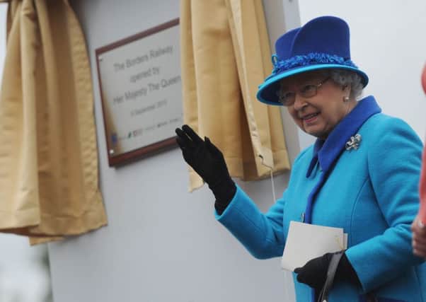 The Queen unveiling the plaque at Tweedbank last year.