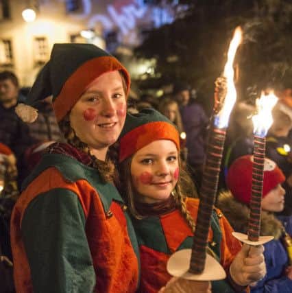 Elves Abigail Anderson and Christie Hunter at Lauder's torchlit parade last year.