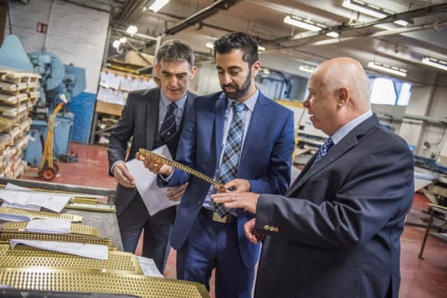 Visit to G&M Radiators, Glasgow. John McGeady, G&M Radiator Manufacturing Business Development Manager, Humza Yousaf, Minister for Transport & the Islands, John Blake, G&M Radiator Manufacturing Managing Director
