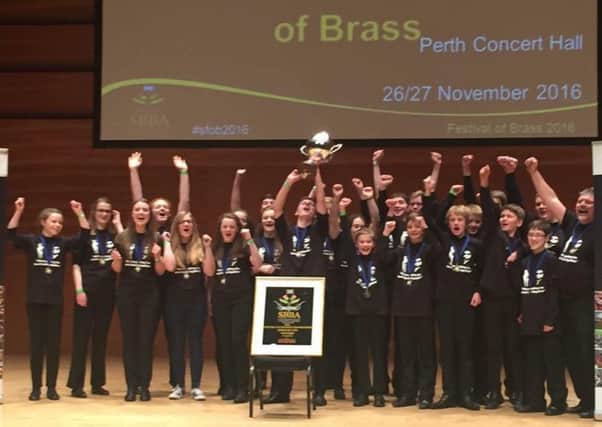 Scottish Borders Youth Brass Band (SBYBB) was crowned Scottish champions amid emotional scenes at Perth Concert Hall.