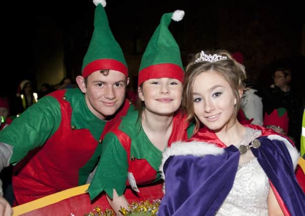 Elves Charlie Lauder and Chloe Cooper with Winter Princess Abigail Stephenson.