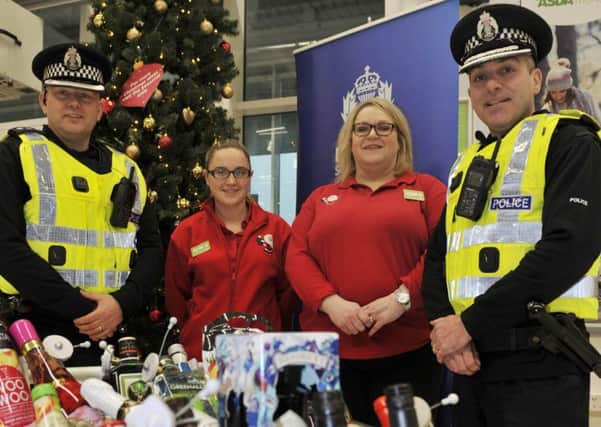 L-r, Chief Inspector Andy McLean, Amy Welsh (Community Colleague at Asda Galashiels), Lynne Mycock (Asda Galashiels manager) and Superintendent Jim Royan in Asda, Galashiels ahead of the festive campaign.