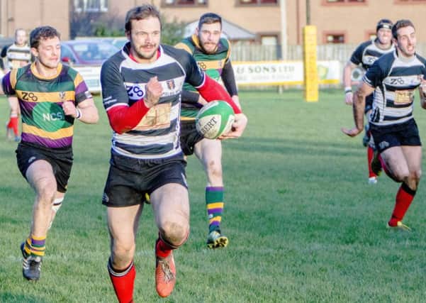 Tryscorer Gregg Minto, seen here heading for the line in a previous game against Cartha QP (picture by Gavin Hosrburgh)