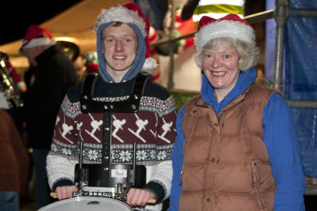 Euan Glendinning and Fiona Neary  from Jed Forest Silver Band enjoying The Craic at Earlston Christmas festival.