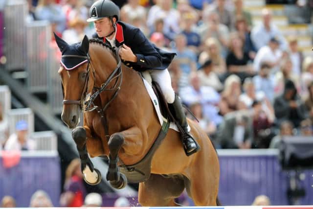 08/08/2012,  TSPL, Scotsman Publications, London Olympic Games 2012. Equestrian Individual Jumping, Greenwich park., Scott Brash, GBR comes over the last jump on Hello Sanctos.  Pic Ian Rutherford