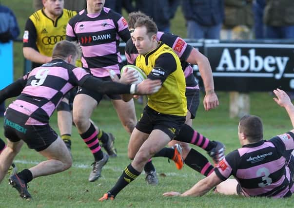Austin Lockington powers through for the first Melrose try in their 27-10 win over Ayr (picture by Douglas Hardie)