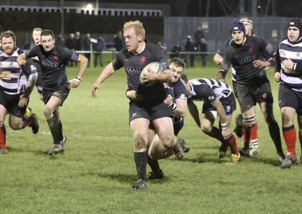 Kelso, in stripes, defeated Biggar to remain top of National League 2.