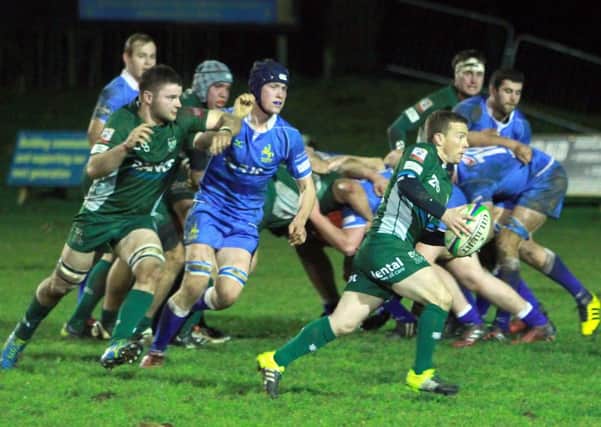 Hawick's scrum half Bruce Campbell breaks loose against blue-clad Jed-Forest at Riverside (picture by Bill McBurnie)
