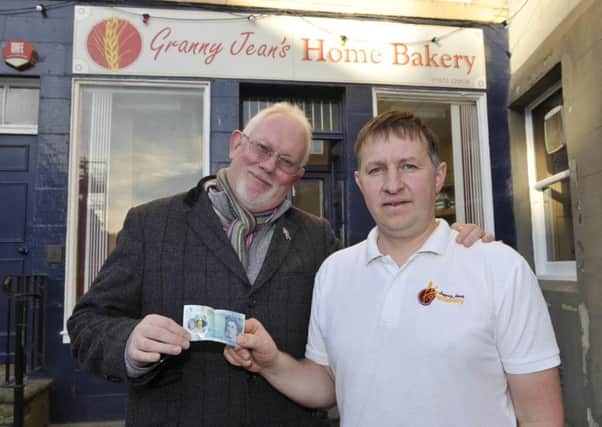 Art gallery owner Tony Huggins-Haig and Alan Malone, head baker at Granny Jean's Home Bakery in Kelso.