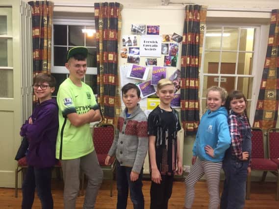 Berwick Operatic Society's production of Oliver! Cast of Oliver, Dodger and Bet played by Morgan Flannigan, Sam Rogers, Levin Bell, Corey Learmonth, Freya Simpson and Edith Bell.