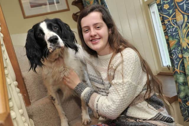 Freya McIlwraith at home in Midlem near Selkirk with Harley the dog. Freya is raising money to go to Bolivia to help out charities.