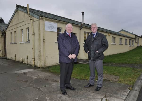 Hawick councillors Stuart Marshall and Watson McAteer outside Scott and Charters' current premises in Fairhurst Drive, Burnfoot.