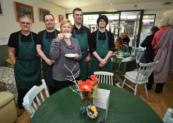 Trustees' chairman Jenni Green with staff at the Almond Tree cafe in Hawick.