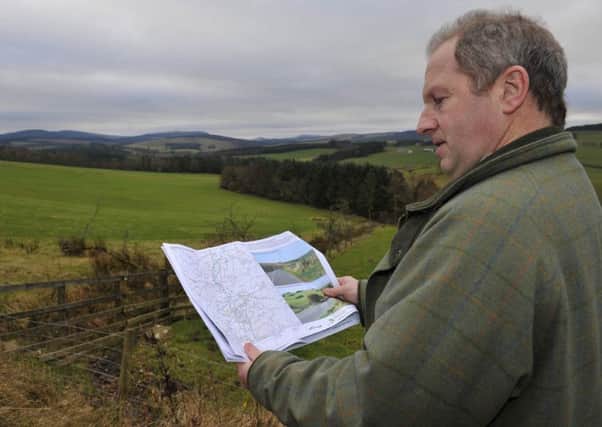 Philip Kerr looking towards Wauchope West, another proposed wind farm site near Hawick.