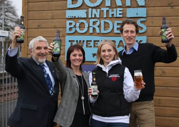 From left: Councillor Stuart Bell, SBC's executive member for economic development, Nicola Duffy of Born in the Borders, Annika Meiklejohn of Tempest Brewery and Giles Ingram of Abbotsford House toast the new data which shows tourism in the Borders has seen a major boost since the introduction of the Borders Railway.