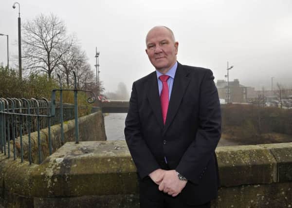Hawick councillor Watson McAteer near where the town's old railway bridge used to be.